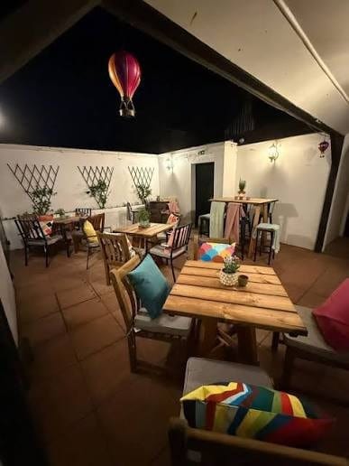 Warm timber pub interior with inviting tables